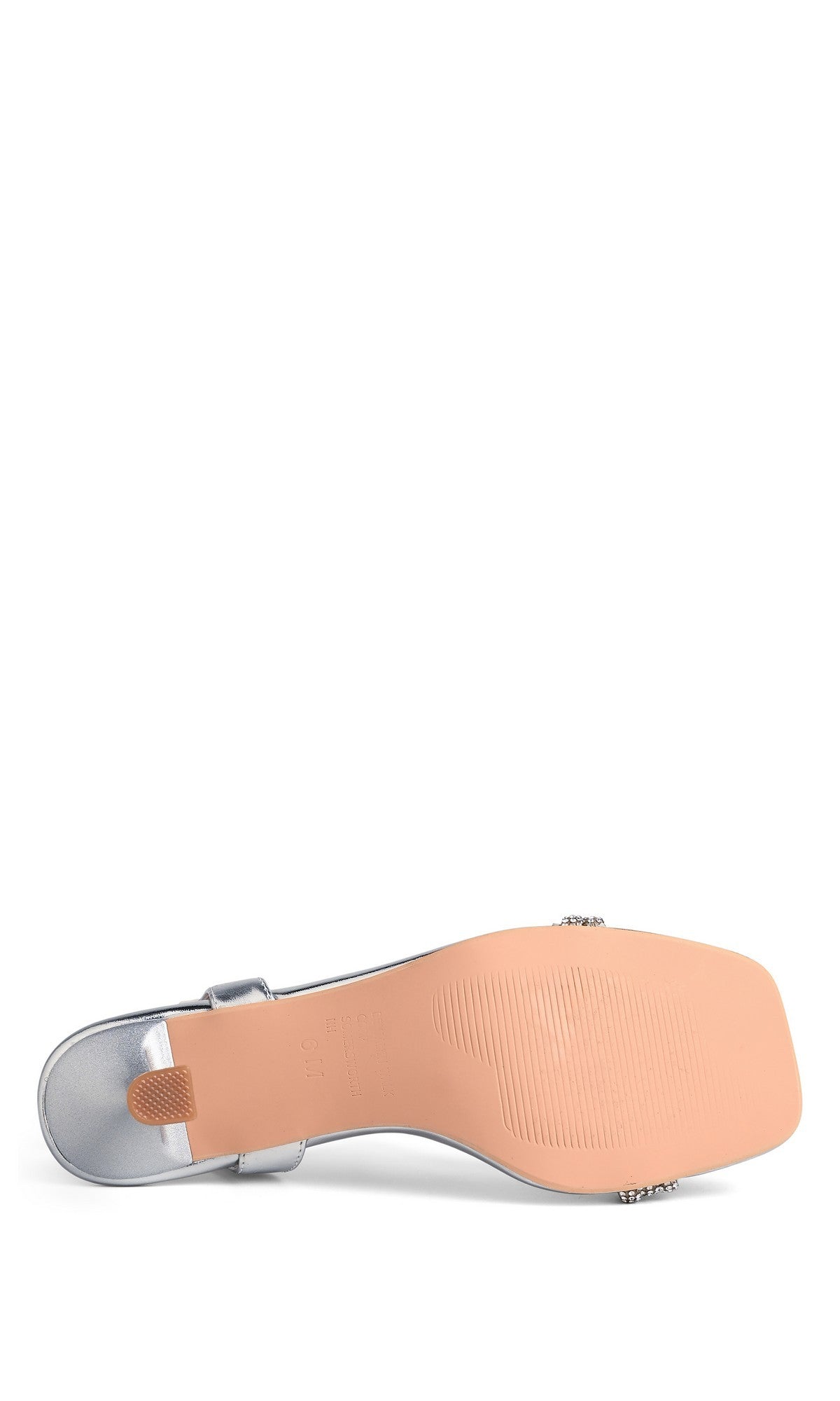 The image shows the bottom view of the Tiffany Silver Prom Shoes: Touch Ups 4757, featuring a flat, slightly textured tan sole and a square toe—ideal for those seeking crystal embellished or elegant silver prom sandals.